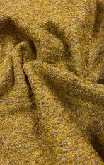 Speciaal bouclè-stofje met rubberen achterkant. - Meubelstof