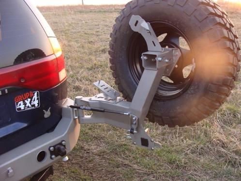 F4x4 - HI-LIFT JACK HOLDER VOOR RESERVEWIELDRAGER, Auto diversen, Krikken, Ophalen of Verzenden