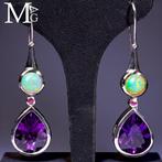 Zilveren oorbellen met Ethiopisch opaal, robijn en