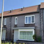 Ruime tussenwoning met tuin, parkeerplaats en vrij uitzicht