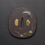 Tsuba zwaardbeschermer – pruimen- en kraanmotief met