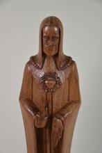 Veiling van inboedel met veel religieuze items en iconen