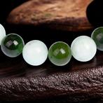 Armband met bollen van zeldzame natuurlijke groene larimar