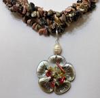 Rodoniet en Rodocrosiet met krachtigste amulet, ontbonden: