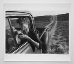 Larry Towell - My oldest son Moses Towell eats a wild pear.