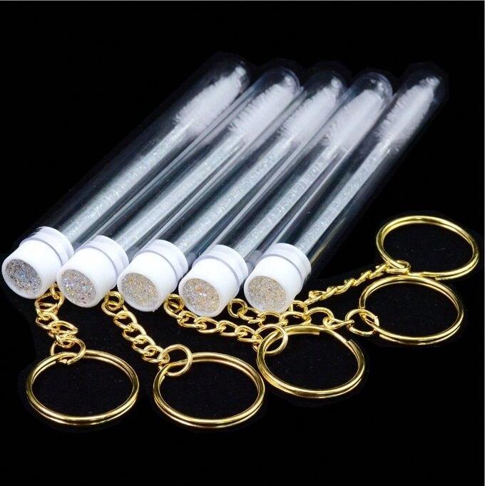 Wimperborstel Sleutelhangers Wit, Kleding | Dames, Carnavalskleding en Feestkleding, Nieuw, Ophalen of Verzenden