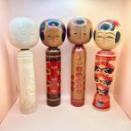 Set van 4 traditionele Kokeshi-poppen - bekroonde poppen en