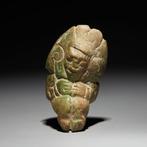 Maya Jade Maskvormige hanger. 600 n.Chr. 6,4 cm hoog.