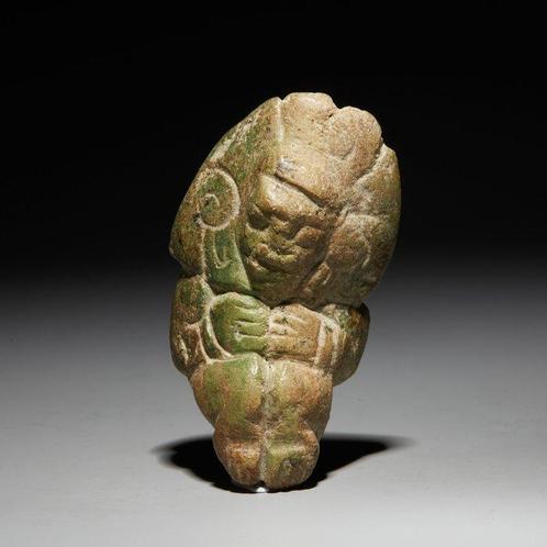 Maya Jade Maskvormige hanger. 600 n.Chr. 6,4 cm hoog., Verzamelen, Mineralen en Fossielen