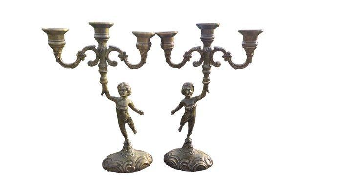 Kandelaber (2) - Gepatineerd brons - Set Putti Alati Rococò, Antiek en Kunst, Curiosa en Brocante