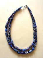 Snoer, opgebouwd uit twee strengen met 55 zeldzame mooie,