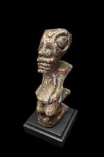Curiosty cabinet -Copper Tiki statue on a wooden base,