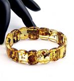 Luxe amber armband – Gepolijste fossiel segmenten, zichtbare