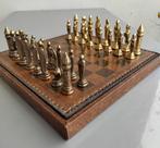Schaakspel - medievali in metallo dorato e bronzato,