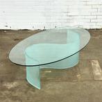 Ovale glazen salontafel met golf / s shape poot, Huis en Inrichting, Tafels | Salontafels, Nieuw