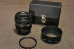Nikon AF Nikkor 1,8/85mm + funda + filtro + parasol metálico, Nieuw