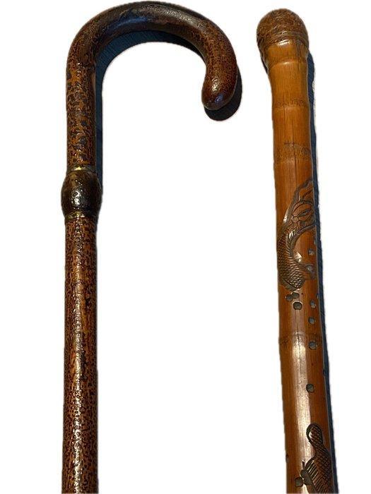 Wandelstok (2) - 1 in een metalen legering en 1 wandelstok, Antiek en Kunst, Antiek | Overige Antiek