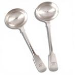 Matching pair of Victorian sterling silver sauce or cream