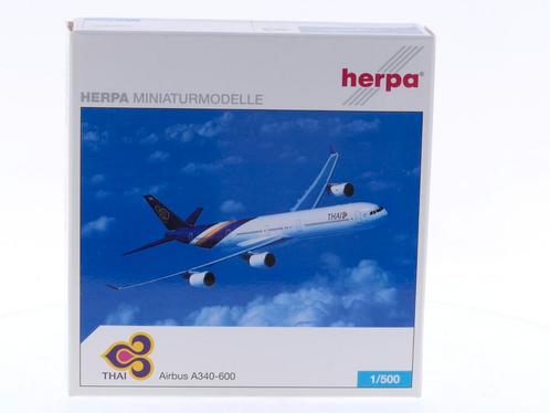 Schaal 1:500 Herpa 507080 Thai Airways Airbus Watthana N..., Hobby en Vrije tijd, Modelbouw | Vliegtuigen en Helikopters, Gebruikt