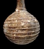 Oud-Romeins Glazen fles met spiraalvormig afgewerkte net -