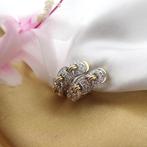 Bicolor oorbellen met diamant; 0,48 ct., Sieraden, Tassen en Uiterlijk, Oorbellen, Gebruikt, Overige kleuren, Ophalen of Verzenden