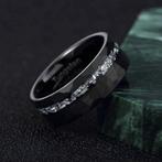 Tungstenen ring. Meteorietinleg. De energie van het
