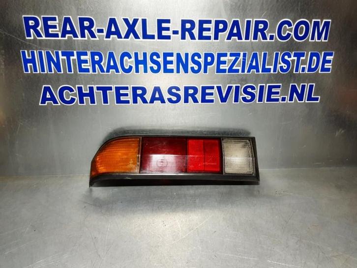 Achterlicht links Opel Manta B met zwarte rand, merk Hella., Auto-onderdelen, Carrosserie en Plaatwerk, Gebruikt, Opel, Verzenden