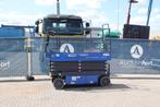 Veiling: Schaarlift Aichi SV08CNL Elektrisch 9.77m 2012, Zakelijke goederen, Machines en Bouw | Liften, Steigers en Ladders, Ophalen