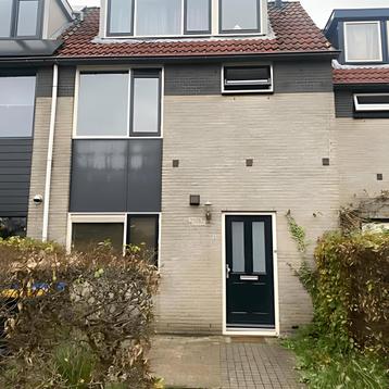 Rijtjeshuis met tuin en tijdelijke huurperiode beschikbaar voor biedingen
