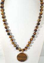 Gouden Tijgeroog - Bevordert het christelijk geloof -