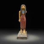 Replica van het oude Egyptisch Houten standbeeld aanbiddende
