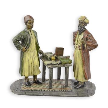 A BRONZE SCULPTURE OF TWO ARAB SCRIBES (Interieur) beschikbaar voor biedingen