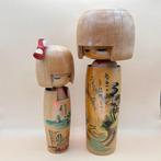 Set van 2 scenische souvenirpopjes door Kunio Miyagawa,