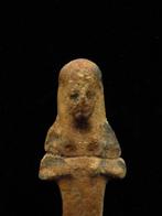 Oud-Egyptisch Faience Gewelde Ushabti die een schoffel en