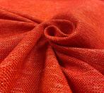 Stof met een ruwe linnen uitstraling in rood-oranje -