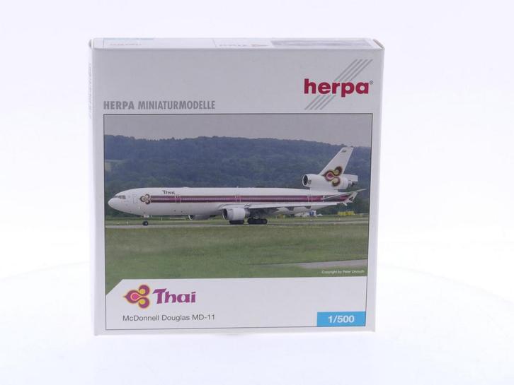 Schaal 1:500 Herpa 514507 Thai Airways - McDonnell Dougla..., Hobby en Vrije tijd, Modelbouw | Vliegtuigen en Helikopters, Gebruikt