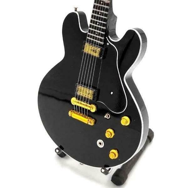 Miniatuur Gibson Lucille gitaar met gratis standaard, Verzamelen, Muziek, Artiesten en Beroemdheden, Overige typen, Nieuw, Ophalen of Verzenden
