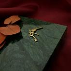 Gouden hanger van een sleutelbos (sleutelhanger), Ophalen of Verzenden, Gebruikt, Goud, Overige merken