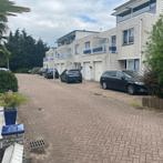 Eengezinswoning met tuin en parkeerplaats in Mariahoeve