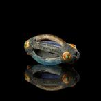 Oud-Romeins geperforeerde polychrome glas Evil Eye kraal