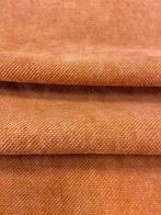 Prachtig en consistent oranje weefsel met stone wash-effect,