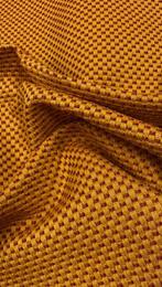 Een geweven stof met een regelmatig geometrisch dessin van