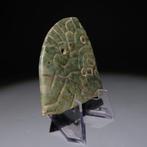 Maya Steen Fragment van een pectoraal. 300-600 na Christus.