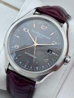 Baume & Mercier - Clifton Dual Time Automatic - - 65730 -, Sieraden, Tassen en Uiterlijk, Horloges | Heren, Nieuw