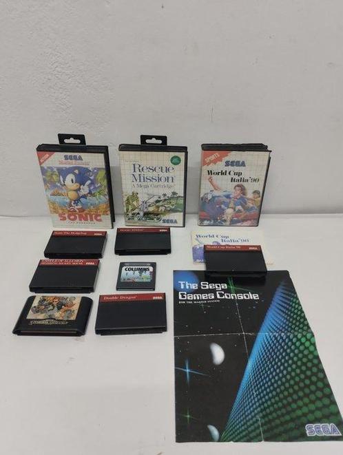 Sega - Master System - various games with cases, manuals and, Spelcomputers en Games, Spelcomputers | Overige Accessoires