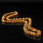 Baltisch barnsteen sieraden – met de hand gesneden gedraaide