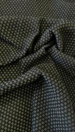 Grof geweven stof met donkergrijs en licht olijfgroen. -