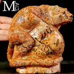 Uitgeholde leopardietbeeldhouwwerk - Beeld in leopardiet dat