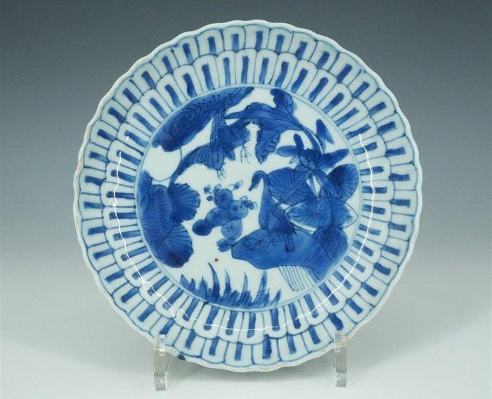 Een Chinees blauw-wit porseleinen bord, Wanli, 17e eeuw -, Antiek en Kunst, Antiek | Overige Antiek