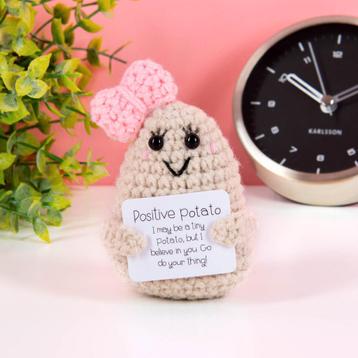 Positive potato met strikje beschikbaar voor biedingen